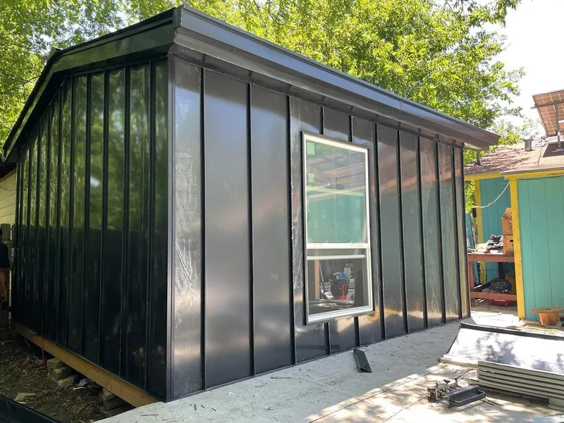 Black standing seam metal wall panels for Roof Inspection in Munhall